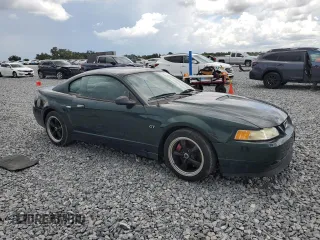 2001 Ford Mustang GT Deluxe with VIN 1FAFP42X61F262133, listed as a Copart auction lot 60112915 with 98,102 mi miles and Salvage title. Bid and sale history available at DreamBid. Image 4.