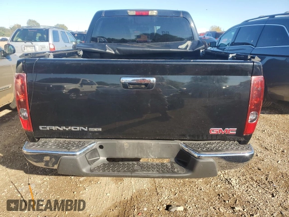 2011 GMC Canyon SLE1 with VIN 1GTH6MFE1B8128778, listed as a Copart auction lot 72456434 with 63,849 mi miles and Salvage Title. Bid and sale history available at carsss.com. Image 6.