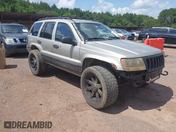 2004 Jeep Grand Cherokee Laredo with VIN 1J4GW48S34C354006, listed as a IAAI auction lot 42599812 with 258,004 mi miles and . Bid and sale history available at DreamBid. Image 1.