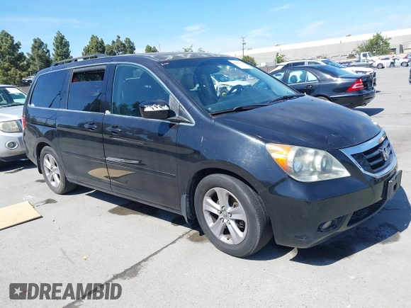 2008 Honda Odyssey Touring with VIN 5FNRL38948B116432, listed as a IAAI auction lot 42162566 with 121,996 mi miles. Bid and sale history available at carsss.com. Image 1.