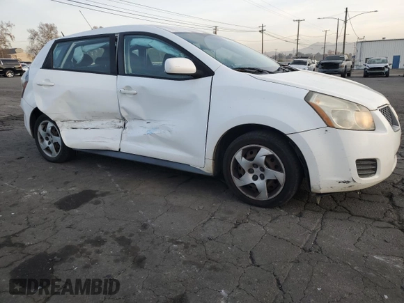 2009 Pontiac Vibe w/1SA with VIN 5Y2SL67809Z439030, listed as a Copart auction lot 87419194 with 104,518 mi miles and Salvage Title. Bid and sale history available at carsss.com. Image 4.