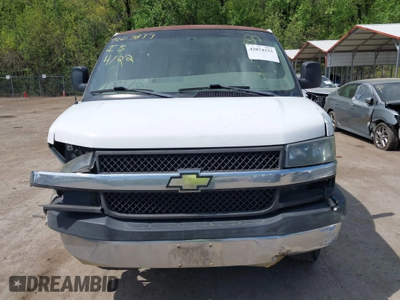 2005 Chevrolet Express Passenger with VIN 1GAHG35U051181753, listed as a IAAI auction lot 42074333 with 335,090 mi miles and . Bid and sale history available at DreamBid. Image 12.