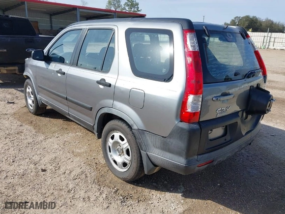 2006 Honda CR-V LX with VIN JHLRD68586C024863, listed as a IAAI auction lot 41569505 with 210,624 mi miles. Bid and sale history available at carsss.com. Image 3.
