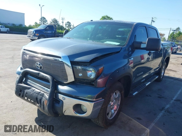 2010 Toyota Tundra with VIN 5TFEY5F11AX097360, listed as a IAAI auction lot 41990256 with 350,830 mi miles and . Bid and sale history available at DreamBid. Image 19.