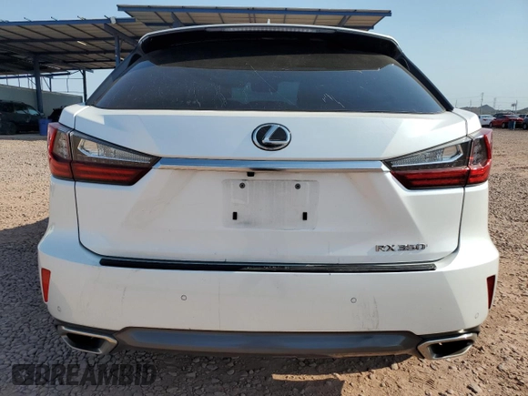 2016 Lexus RX 350 with VIN 2T2BZMCA5GC033906, listed as a Copart auction lot 64869445 with 129,861 mi miles and Salvage title. Bid and sale history available at DreamBid. Image 6.