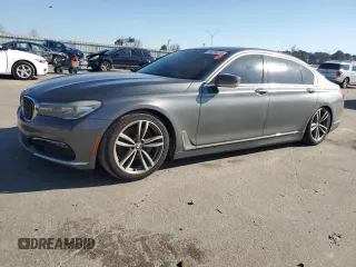 2016 BMW 7 Series 740i with VIN WBA7E2C51GG504431, listed as a Copart auction lot 44016215 with 135,690 mi miles and Clean Title. Bid and sale history available at carsss.com. Image 1.