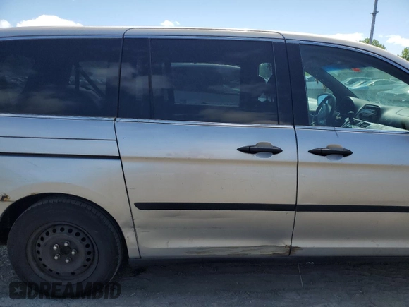 2009 Honda Odyssey LX z VIN 5FNRL38269B022704, wystawiony jako Copart lot #57833865 z przebiegiem Nie podano mil oraz Czysty tytuł • Clean title. Historia ofert i sprzedaży dostępna na DreamBid. Obrazek 11.