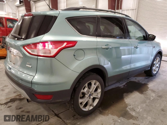 2013 Ford Escape SEL with VIN 1FMCU9H93DUA72099, listed as a Copart auction lot 58691955 with 30,449 mi miles and Salvage title. Bid and sale history available at DreamBid. Image 3.