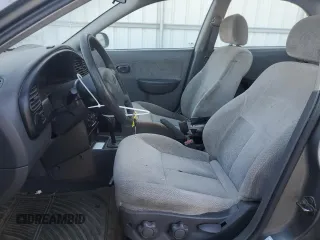 2003 Kia Spectra with VIN KNAFB121235248271, listed as a Copart auction lot 82426614 with 151,347 mi miles and Salvage Title. Bid and sale history available at DreamBid. Image 7.