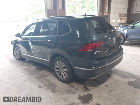 2018 Volkswagen Tiguan SEL with VIN 3VV2B7AX3JM133326, listed as a IAAI auction lot 42459190 with 94,665 mi miles and . Bid and sale history available at DreamBid. Image 3.