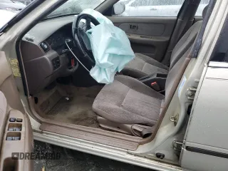 1998 Nissan Sentra XE with VIN 3N1AB41D5WL045702, listed as a Copart auction lot 45149225 with 205,521 mi miles and Salvage title. Bid and sale history available at DreamBid. Image 7.