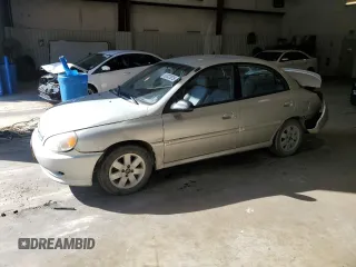 2002 Kia Rio with VIN KNADC123326133077, listed as a Copart auction lot 52427975 with 105,357 mi miles and Salvage Title. Bid and sale history available at carsss.com. Image 1.