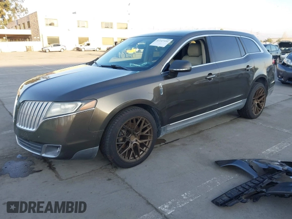 2011 Lincoln MKT with VIN 2LMHJ5AR8BBJ54371, listed as a IAAI auction lot 41147331 with 111,347 mi miles and . Bid and sale history available at DreamBid. Image 2.