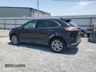 2019 Ford Edge Titanium z VIN 2FMPK3K97KBB88857, wystawiony jako Copart lot #60638805 z przebiegiem 124 068 mil mil oraz Czysty tytuł • Clean title. Historia ofert i sprzedaży dostępna na DreamBid. Obrazek 2.
