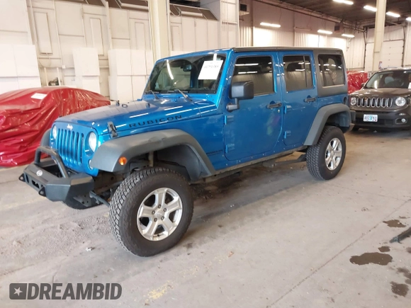 2015 Jeep Wrangler Unlimited Rubicon with VIN 1C4BJWFG7FL661643, listed as a IAAI auction lot 41291385 with 112,785 mi miles. Bid and sale history available at carsss.com. Image 2.