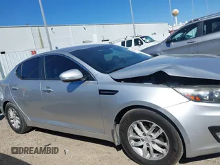 2013 Kia Optima LX z VIN KNAGM4A70D5414844, wystawiony jako IAAI lot #41774246 z przebiegiem 180 332 mil mil oraz . Historia ofert i sprzedaży dostępna na DreamBid. Obrazek 12.
