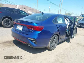 2021 Kia Forte GT-Line z VIN 3KPF34AD6ME284046, wystawiony jako IAAI lot #42231501 z przebiegiem 97 877 mil mil oraz . Historia ofert i sprzedaży dostępna na DreamBid. Obrazek 4.