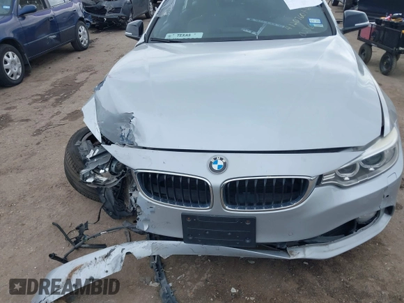 2015 BMW 4 Series 435i xDrive z VIN WBA4B3C58FD670236, wystawiony jako IAAI lot #41364258 z przebiegiem 126 362 mil mil oraz . Historia ofert i sprzedaży dostępna na DreamBid. Obrazek 12.