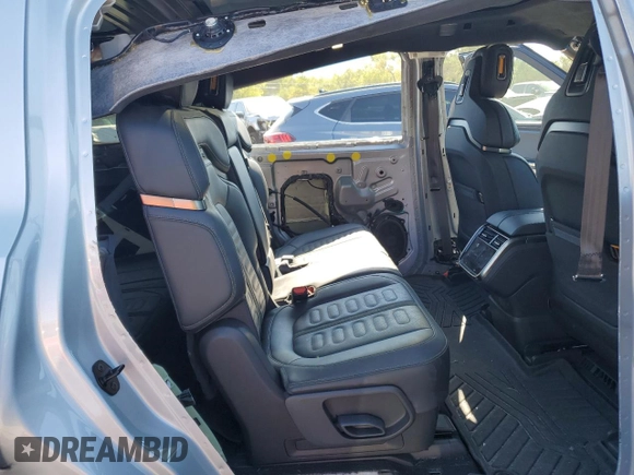 2024 Rivian R1S Adventure with VIN 7PDSGBBA4RN036045, listed as a Copart auction lot 74982414 with 9,256 mi miles and Salvage Title. Bid and sale history available at carsss.com. Image 11.