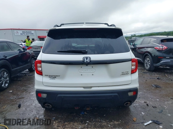 2019 Honda Passport Elite with VIN 5FNYF8H0XKB005151, listed as a IAAI auction lot 42322644 with 124,274 mi miles and . Bid and sale history available at DreamBid. Image 17.