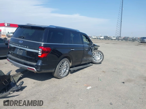 2022 Ford Expedition Platinum with VIN 1FMJU1MT0NEA10620, listed as a IAAI auction lot 41753686 with 58,709 mi miles and . Bid and sale history available at DreamBid. Image 4.
