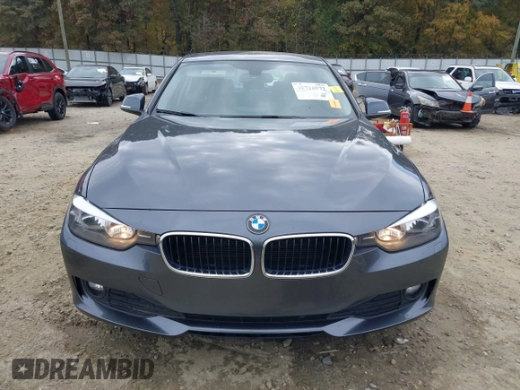 2014 BMW 3 Series 328d xDrive with VIN WBA3D5C59EKX96701, listed as a IAAI auction lot 40716972 with 163,775 mi miles. Bid and sale history available at carsss.com. Image 12.