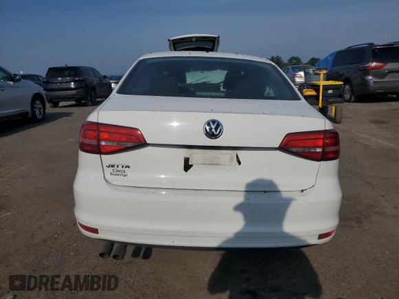 2015 Volkswagen Jetta S z VIN 3VW2K7AJ2FM309510, wystawiony jako Copart lot #60823955 z przebiegiem Nie podano mil oraz Szkoda całkowita • Salvage title. Historia ofert i sprzedaży dostępna na DreamBid. Obrazek 6.