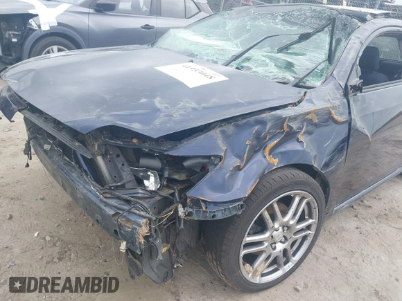 2006 Scion tC z VIN JTKDE177260103580, wystawiony jako IAAI lot #41953048 z przebiegiem 229 007 mil mil oraz . Historia ofert i sprzedaży dostępna na DreamBid. Obrazek 6.