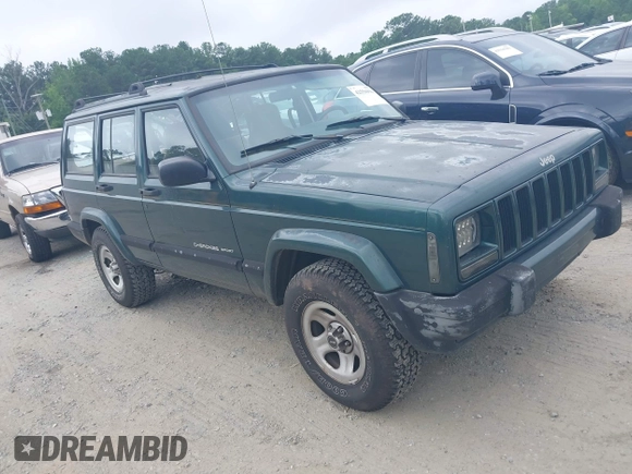 2000 Jeep Cherokee z VIN 1J4FT48S4YL265734, wystawiony jako IAAI lot #42556994 z przebiegiem 228 162 mil mil oraz . Historia ofert i sprzedaży dostępna na DreamBid. Obrazek 1.
