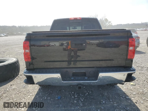 2016 Chevrolet Silverado 1500 LT with VIN 3GCUKREC0GG209747, listed as a Copart auction lot 51067515 with 105,643 mi miles and Salvage Title. Bid and sale history available at DreamBid. Image 6.