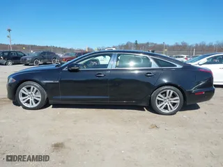 2018 Jaguar XJ with VIN SAJWJ2GD2J8W13463, listed as a IAAI auction lot 41897451 with 70,448 mi miles. Bid and sale history available at carsss.com. Image 14.
