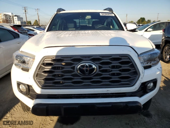 2023 Toyota Tacoma 4WD SR with VIN 3TMCZ5AN3PM618642, listed as a Copart auction lot 50386825 with 35,016 mi miles and Salvage Title. Bid and sale history available at carsss.com. Image 5.