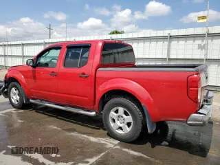 2006 Nissan Frontier LE with VIN 1N6AD07W76C460568, listed as a Copart auction lot 62859015 with 145,127 mi miles and Salvage title. Bid and sale history available at DreamBid. Image 2.