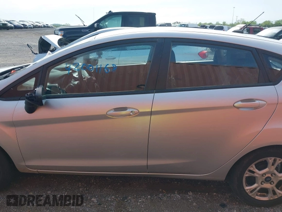 2014 Ford Fiesta SE with VIN 3FADP4EJ0EM215958, listed as a IAAI auction lot 42001168 with 115,231 mi miles and . Bid and sale history available at DreamBid. Image 14.