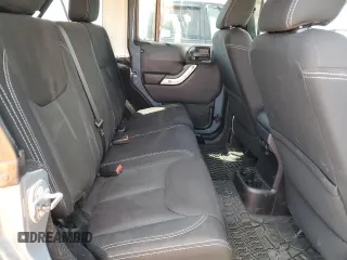 2014 Jeep Wrangler Unlimited Sahara with VIN 1C4BJWEG7EL228307, listed as a Copart auction lot 58663455 with 188,024 mi miles and Salvage title. Bid and sale history available at DreamBid. Image 11.