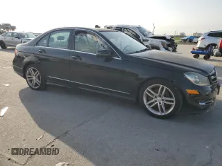 2014 Mercedes-Benz C 250 Sport with VIN WDDGF4HB8EA957803, listed as a Copart auction lot 63412805 with 110,391 mi miles and Clean title. Bid and sale history available at DreamBid. Image 4.