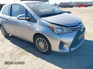 2015 Toyota Yaris L with VIN VNKJTUD38FA020465, listed as a IAAI auction lot 41416577 with 142,751 mi miles. Bid and sale history available at carsss.com. Image 1.