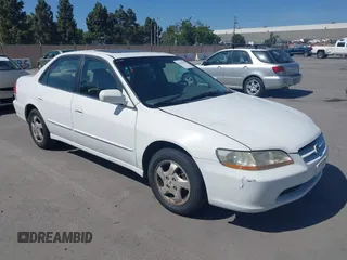 1998 Honda Accord EX z VIN 1HGCG6671WA260072, wystawiony jako IAAI lot #42336337 z przebiegiem 234 922 mil mil oraz . Historia ofert i sprzedaży dostępna na DreamBid. Obrazek 1.