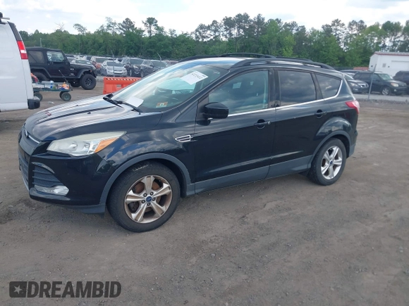 2013 Ford Escape SE with VIN 1FMCU0G9XDUD47433, listed as a IAAI auction lot 42233412 with 180,098 mi miles and . Bid and sale history available at DreamBid. Image 2.