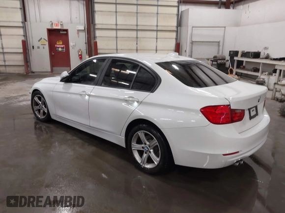 2014 BMW 3 Series 328i with VIN WBA3C1C52EK112194, listed as a IAAI auction lot 41694770 with 139,609 mi miles. Bid and sale history available at carsss.com. Image 3.
