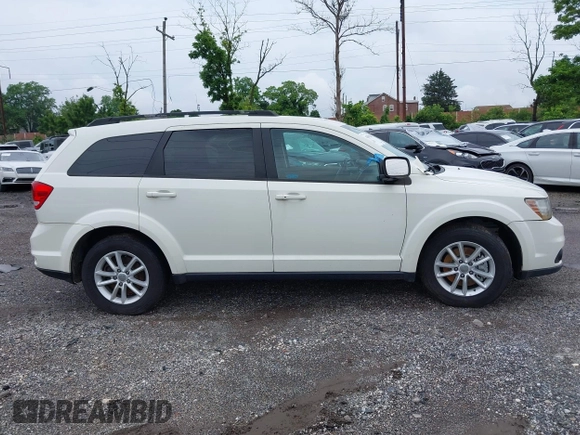 2017 Dodge Journey SXT with VIN 3C4PDDBG2HT702775, listed as a IAAI auction lot 42596303 with 130,639 mi miles and . Bid and sale history available at DreamBid. Image 14.