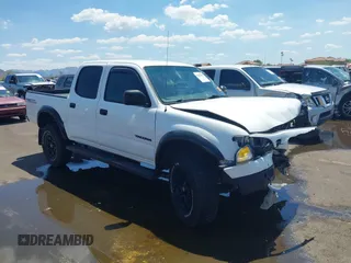 2002 Toyota Tacoma PreRunner z VIN 5TEGN92N82Z114540, wystawiony jako IAAI lot #42422202 z przebiegiem 229 459 mil mil oraz . Historia ofert i sprzedaży dostępna na DreamBid. Obrazek 1.