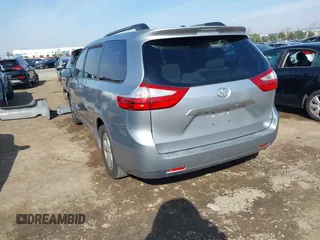 2016 Toyota Sienna LE AAS with VIN 5TDKK3DC2GS750211, listed as a IAAI auction lot 41444073 with 120,185 mi miles. Bid and sale history available at carsss.com. Image 3.
