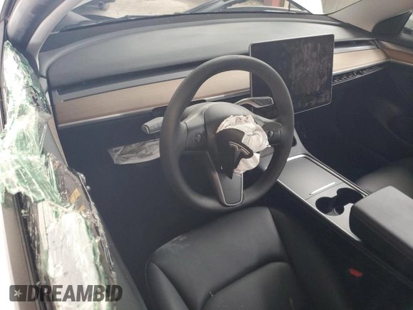 2023 Tesla Model 3 с VIN 5YJ3E1EA5PF514511, выставлен на аукционе Copart как лот 56653775 с пробегом Не указан миль и Списание • Salvage title. История ставок и продаж доступна на DreamBid. Изображение 8.