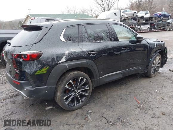 2024 Mazda CX-50 Premium z VIN 7MMVABDYXRN180263, wystawiony jako IAAI lot #41738791 z przebiegiem 9 688 mil mil oraz . Historia ofert i sprzedaży dostępna na DreamBid. Obrazek 4.