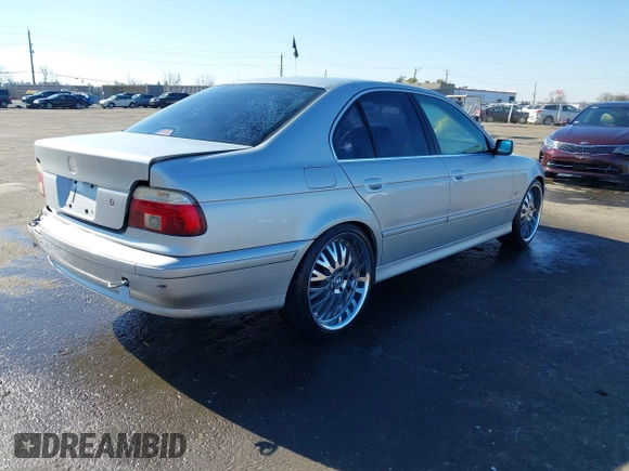 2003 BMW 5 Series 525i with VIN WBADT33473GF43821, listed as a IAAI auction lot 41450822 with 165,062 mi miles. Bid and sale history available at carsss.com. Image 4.
