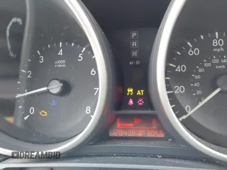 2011 Mazda Mazda3 i Touring with VIN JM1BL1VFXB1472772, listed as a IAAI auction lot 42180030 with 128,438 mi miles. Bid and sale history available at carsss.com. Image 7.
