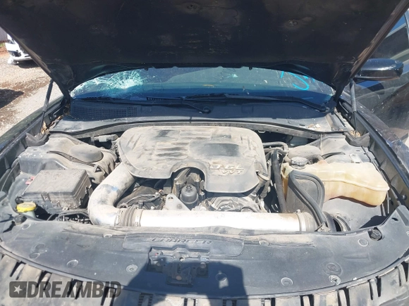 2015 Dodge Charger SXT with VIN 2C3CDXHG5FH928553, listed as a IAAI auction lot 42279342 with 129,402 mi miles and . Bid and sale history available at DreamBid. Image 10.