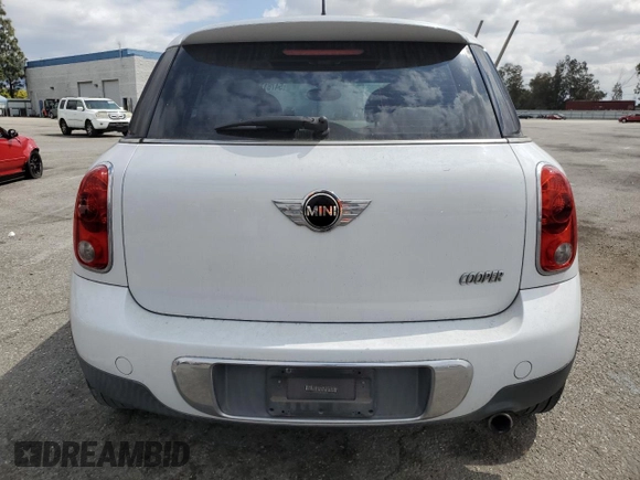 2012 MINI Countryman z VIN WMWZB3C56CWM01948, wystawiony jako Copart lot #54781705 z przebiegiem 128 374 mil mil oraz Szkoda całkowita • Salvage title. Historia ofert i sprzedaży dostępna na DreamBid. Obrazek 6.