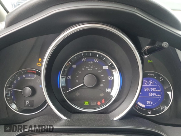 2015 Honda Fit EX-L z VIN 3HGGK5H81FM765225, wystawiony jako Copart lot #56765815 z przebiegiem 126 730 mil mil oraz Szkoda całkowita • Salvage title. Historia ofert i sprzedaży dostępna na DreamBid. Obrazek 9.